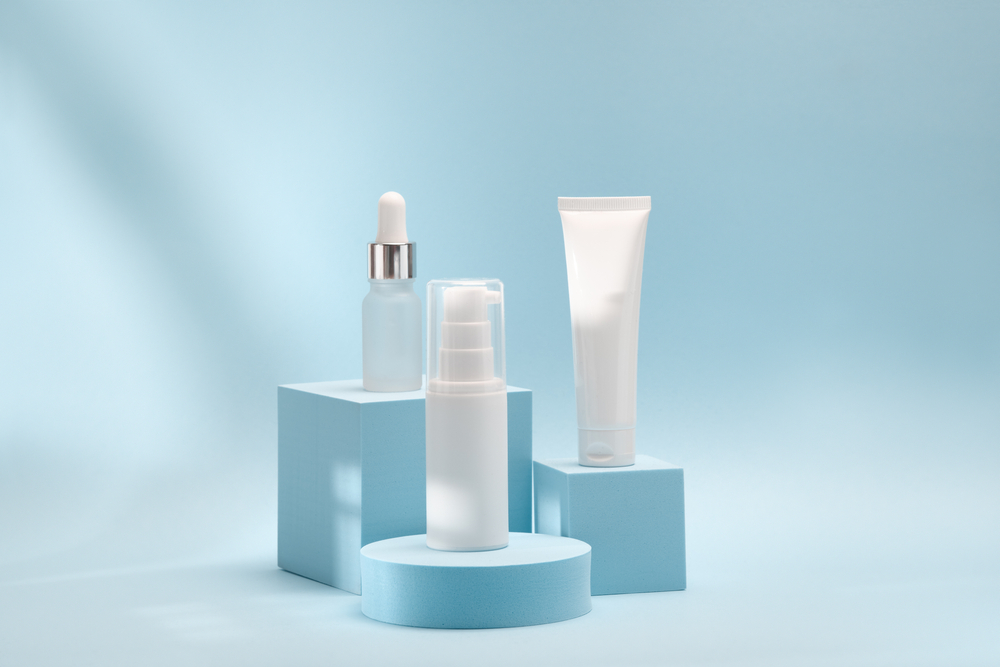 cosmetic product mockups on geometric background